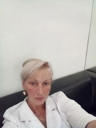  ,   Elina, 57 ,  